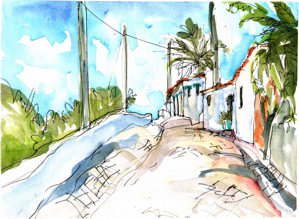 Watercolour painting of Aljezur, Portugal: houses on cobbled street