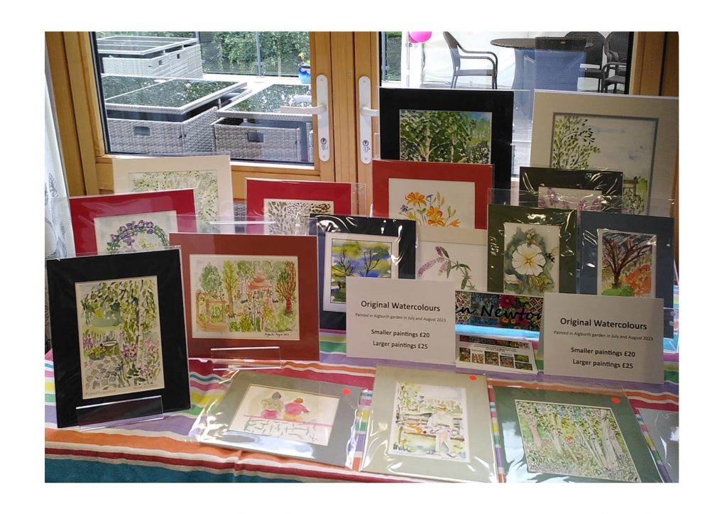 Photo of art works on display at Aigburth, painted by local artists who painted in the garden there over the summer