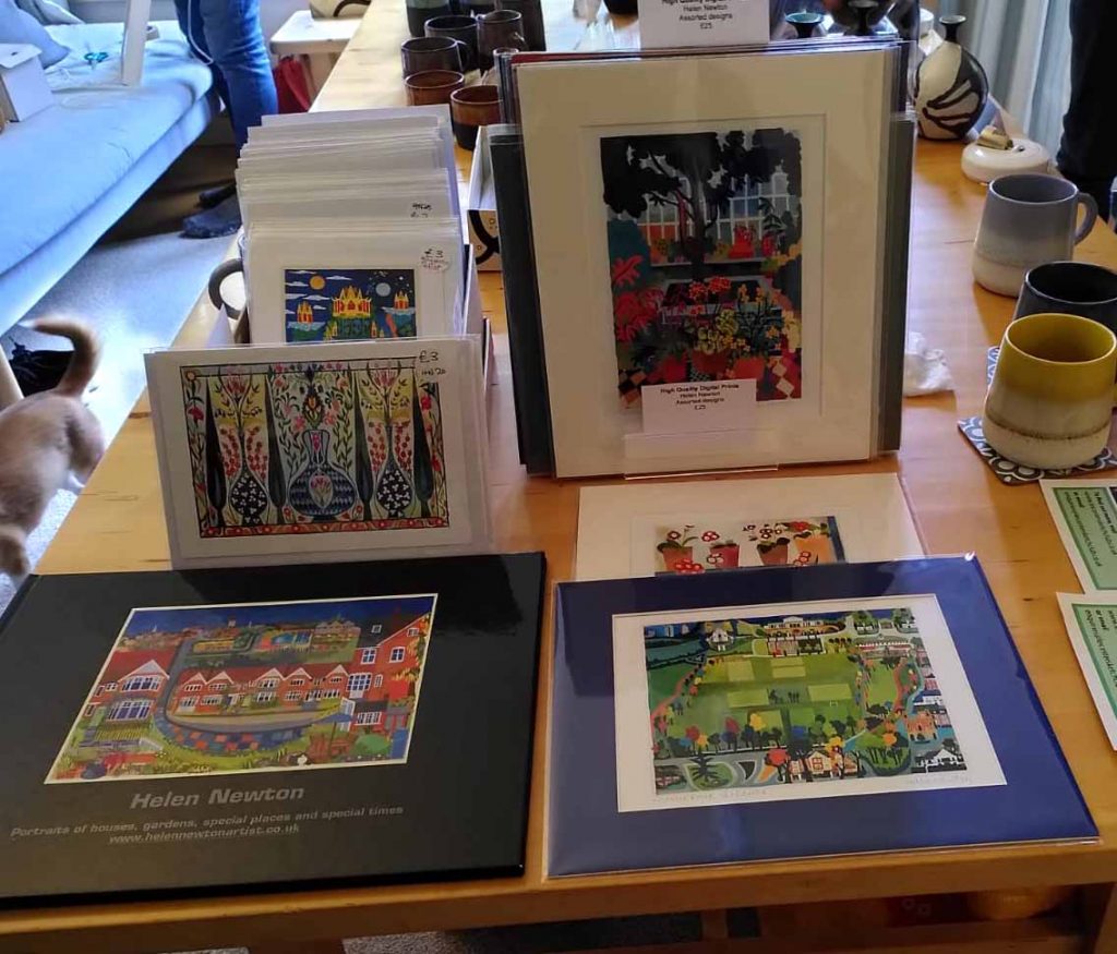 Photo of prints an cards on display at Art House in 2025.